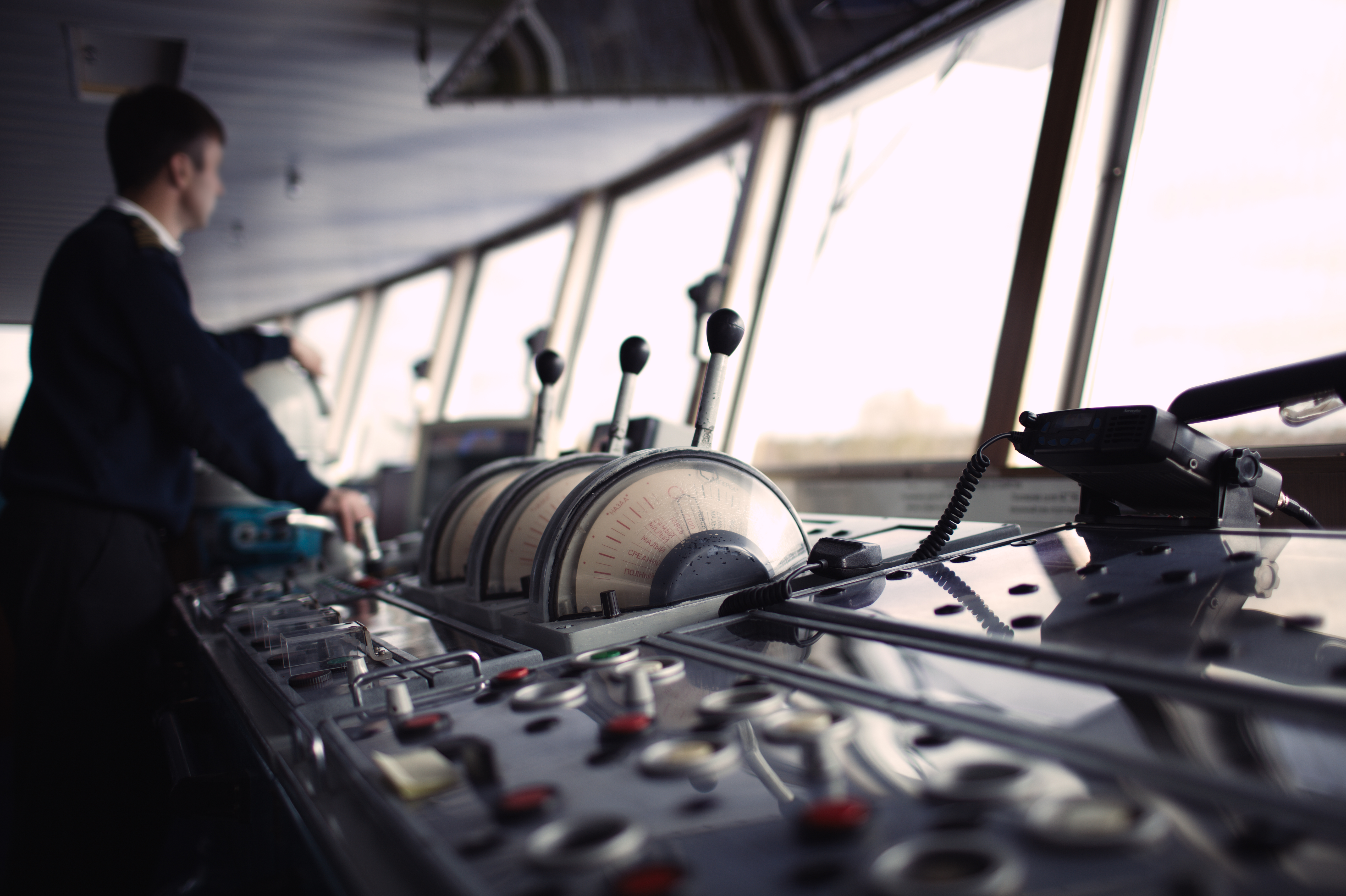 Navigation Officer Driving Ship On The River